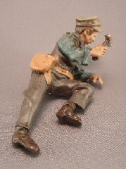 Just Plain Folk Figures Carpenter - Leaning with hammer